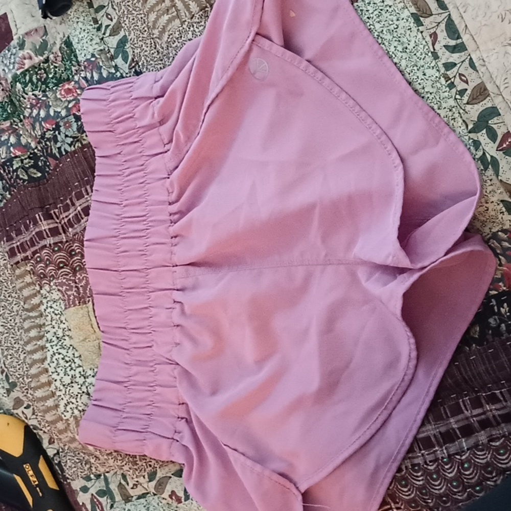 Pink running shorts
